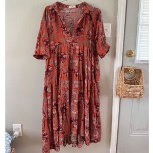 Natural Life Rebecca Midi Dress in an orange tropical floral pattern.